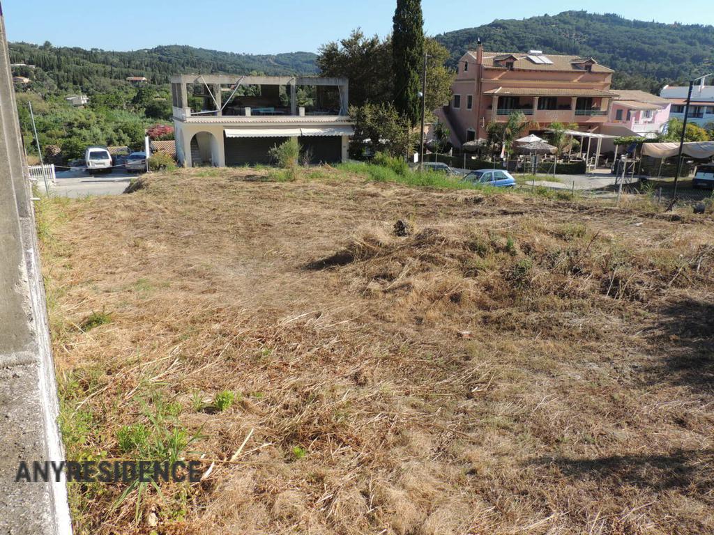 Development land Agios Georgios, photo #1, listing #2150846