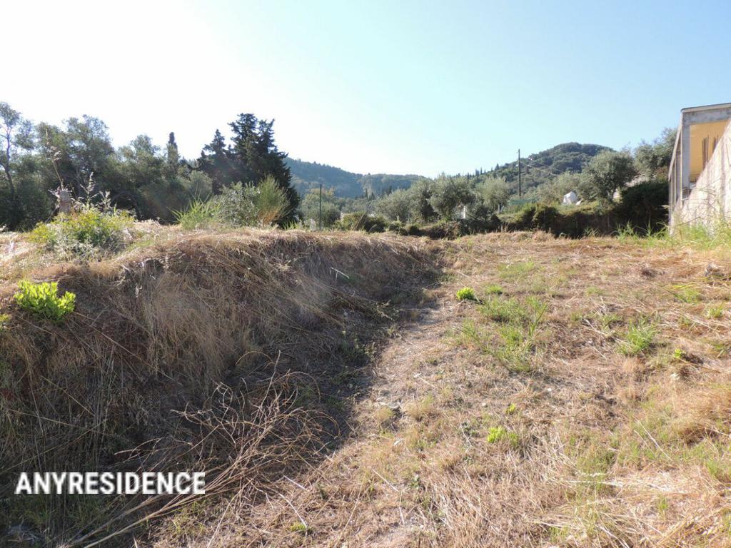 Development land Agios Georgios, photo #3, listing #2150846