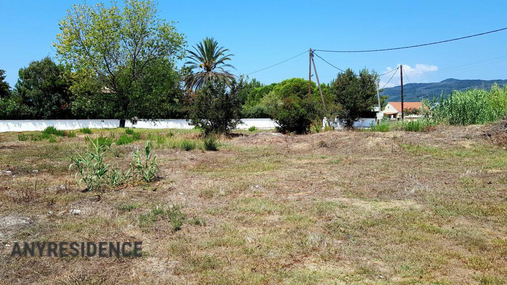Development land Agios Georgios, photo #1, listing #2061715
