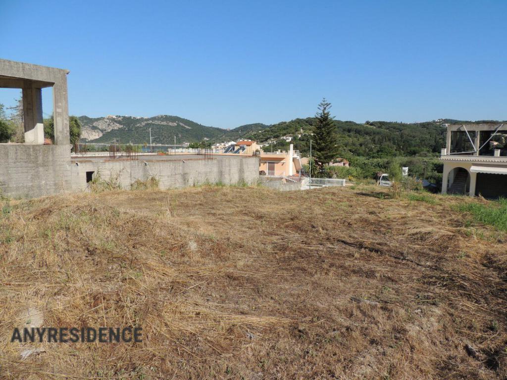 Development land Agios Georgios, photo #7, listing #2150846